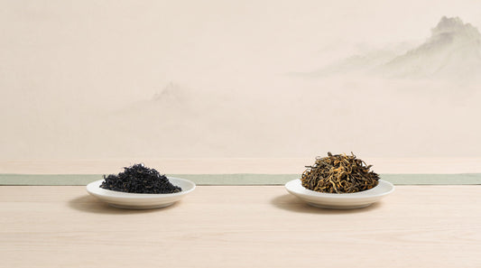 Keemun dry leaf left and Dian Hong dry leaf right on matching dishes